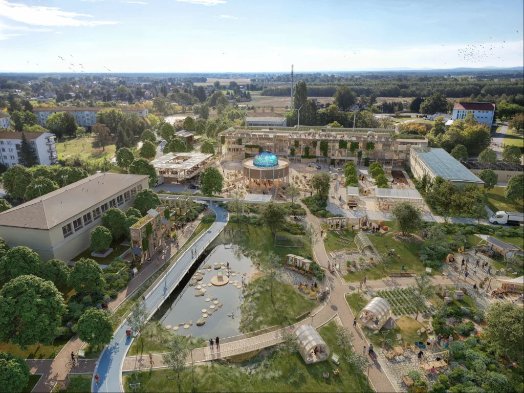 Ecostation Hoyerswerda 2045 – umgestaltetes Schulareal mit Naturlernorten, Teichen, Holzpavillons, urbaner Landwirtschaft und offener Bildungslandschaft.